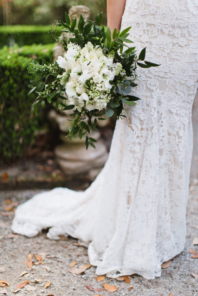 Bride’s gown by Inbal Dror. Bouquet by Out of the Garden. Image by Clay Austin Photography.