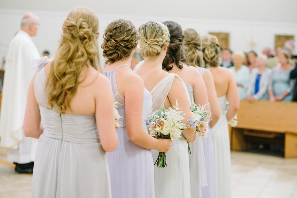 Bridesmaid gowns by Amsale from Bella Bridesmaids. Image by Aaron and Jillian Photography at St. Benedict’s Roman Catholic Church.