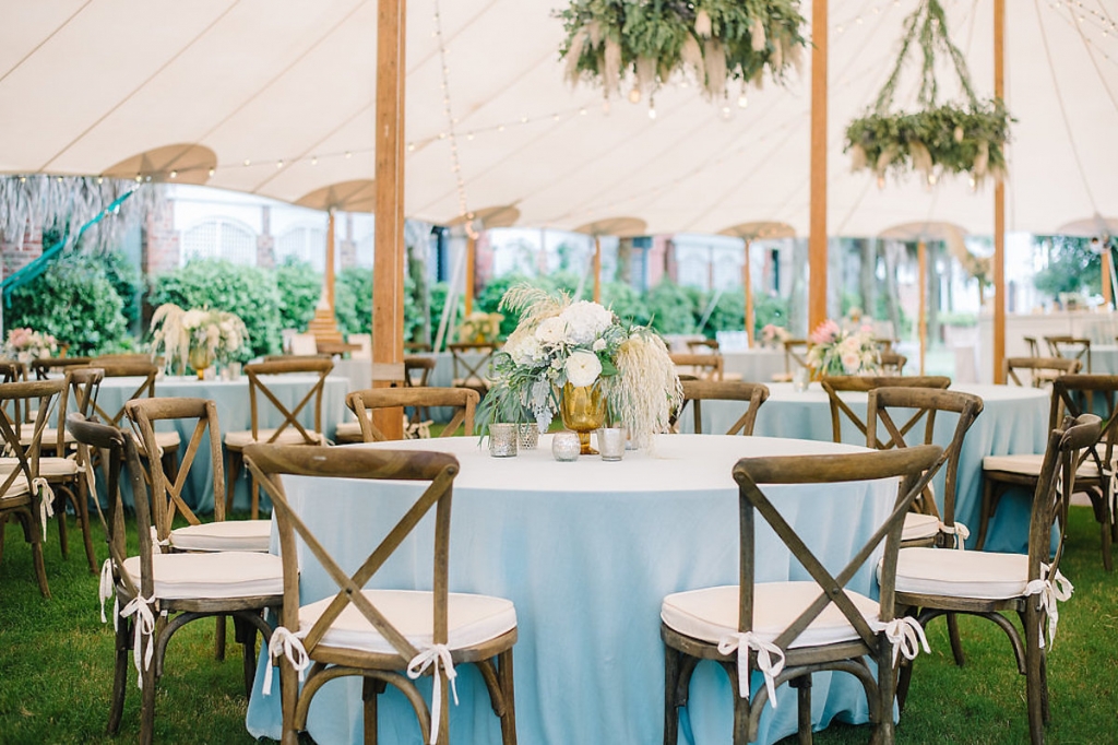 Wedding design by Sweetgrass Social. Florals by Branch Design Studio. Rentals from EventWorks. Tent from Sperry Tents Southeast. Linens from La Tavola. Image by Aaron and Jillian Photography.