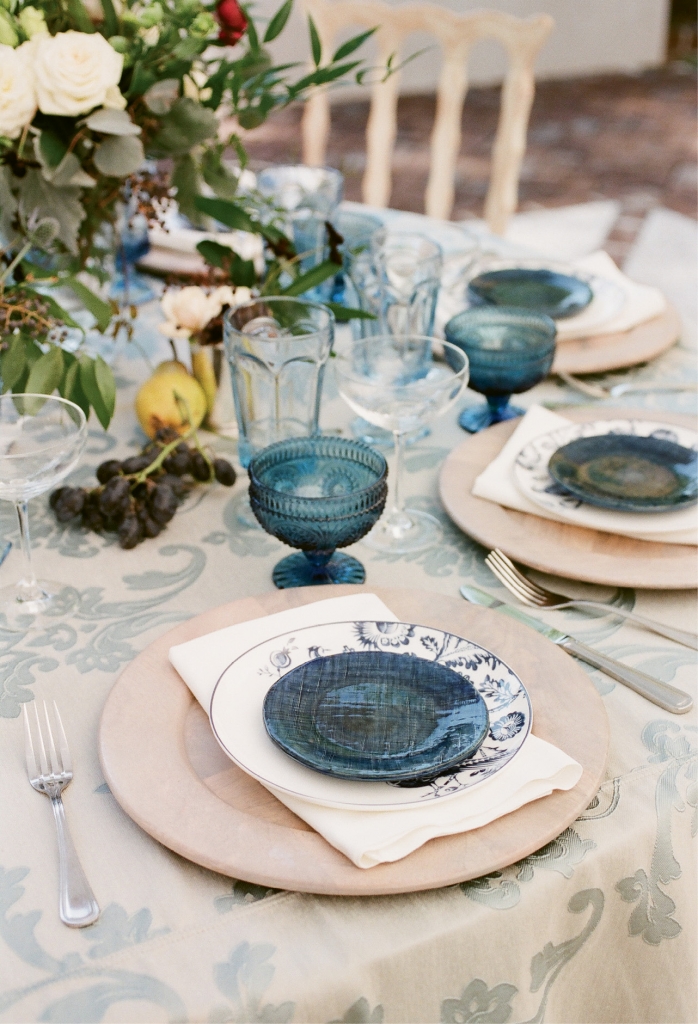 “With blue on everything from the printed materials to the lounge pillows and linens,” says planner Haley, “having china and glassware in shades of blue was a must.”
