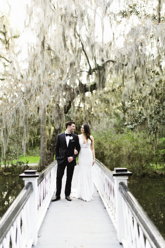 Menswear by Dolce &amp; Gabbana. Bride’s gown by Inbal Dror. Image by Clay Austin Photography at Magnolia Plantation &amp; Gardens