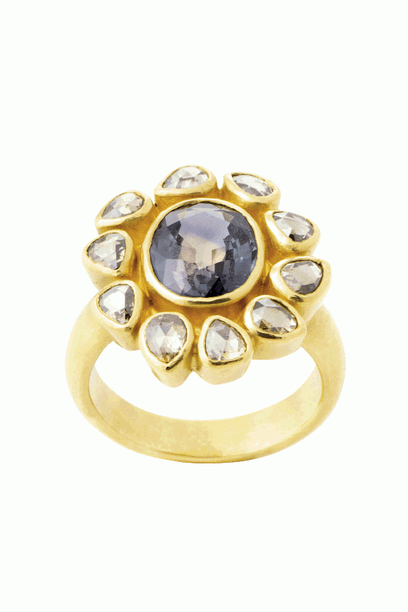 FLOWER POWER:  Sarah Amos’ 22K gold ring with 3 ct. Mughal-style bicolored sapphire surrounded  by rose-cut cognac  diamonds (2.5 total cts.) Helena Fox Fine Art, price upon request