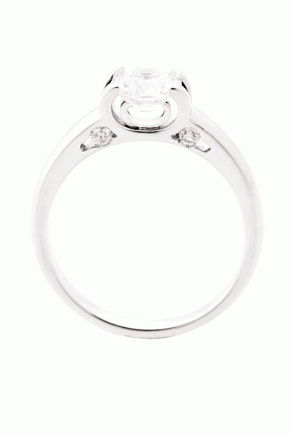 MOD SQUAD:  Platinum ring with a 1.06 ct. round-cut center  diamond and band inset with diamonds  Roberto Coin, $26,820