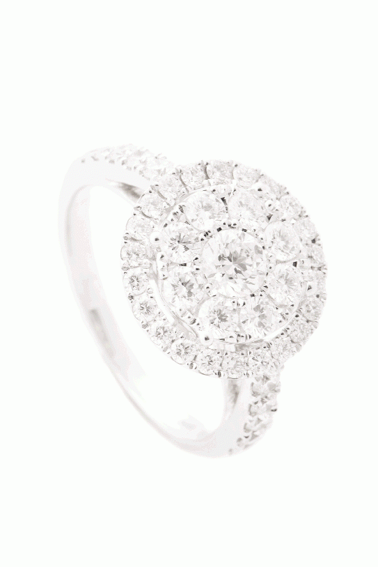 CIRCLE GAME:  18K white gold ring with a center cluster of round-cut Forevermark diamonds and a halo and band inset with pavé diamonds (1.5 total cts.) REEDS Jewelers, $4,295