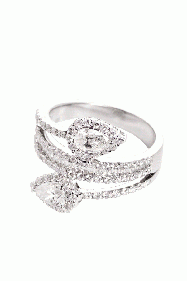 WRAPPED AROUND YOUR FINGER: 14K white gold ring with pear-shaped diamonds (.78 total cts.) accented with round, brilliant-cut (.8 total cts.) and baguette (.24 total cts.) diamonds Kiawah Fine Jewelry, $6,990