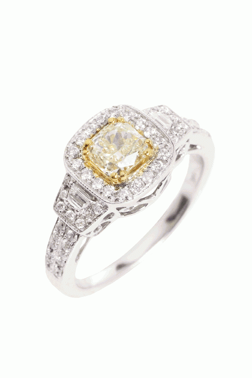 YELLOW FEVER: 14K  white gold ring with .75  ct. canary yellow diamond  accented with diamonds  (1.16 total cts.) REEDS Jewelers, $5,350