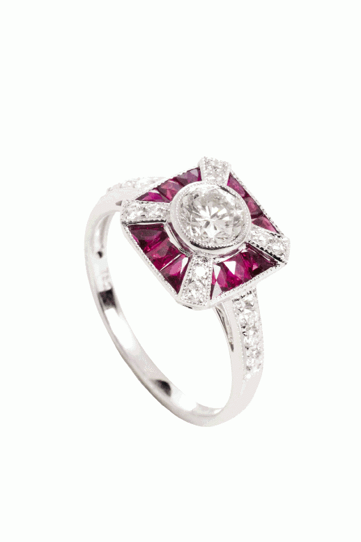 Seeing Red: 18K white gold ring with .49 ct. diamond accented with rubies and diamonds.