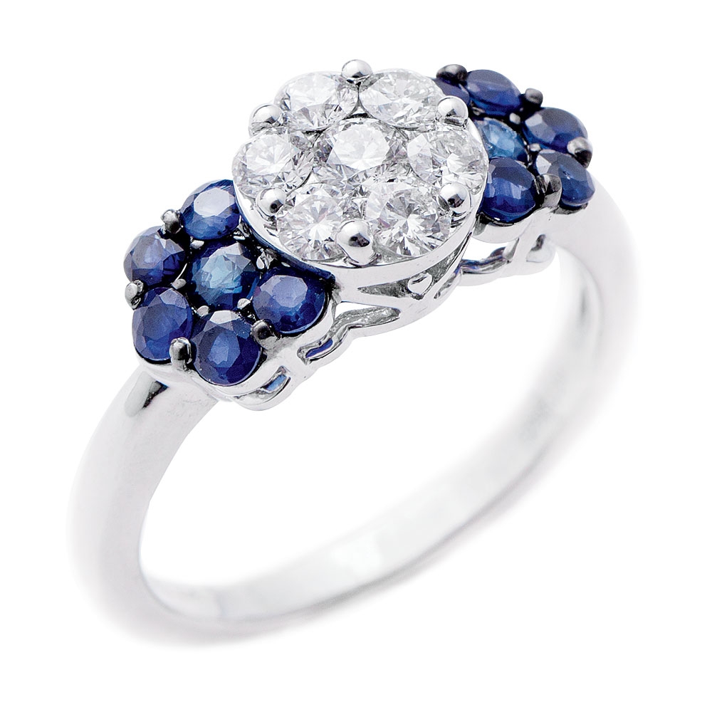 14K white gold ring with diamond cluster center (.5 total cts.) and sapphires (.75 total cts.), from REEDS Jewelers ($2,550)