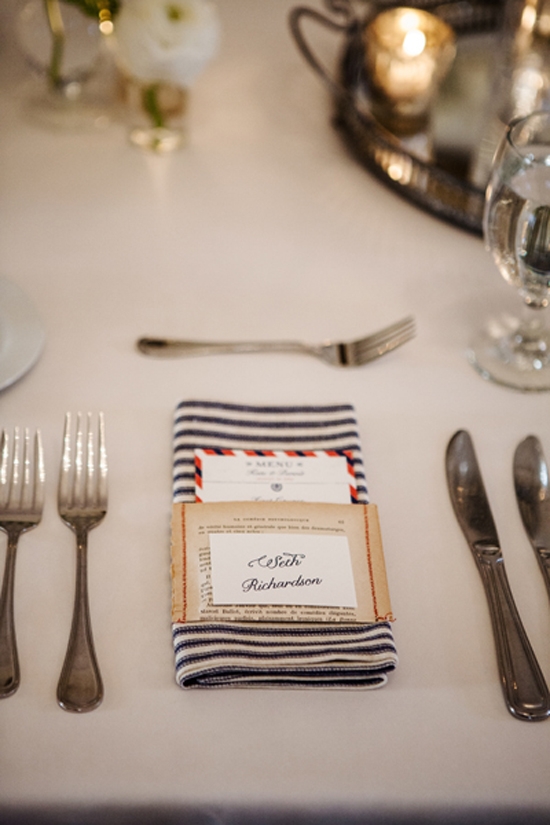 TWO-IN-ONE: WED crafted menu sleeves from book pages, affixed guest names to each, and rested them atop napkins Kathleen’s mother had stitched.