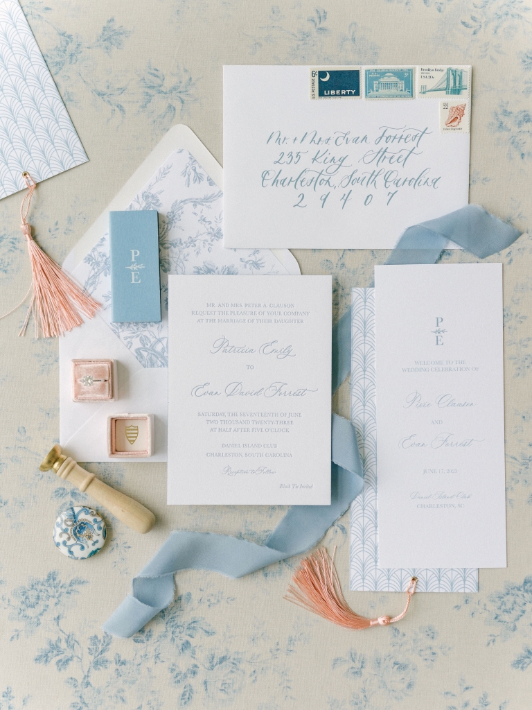 J. Lily Design crafted the airy paper suite in powder blue and white.