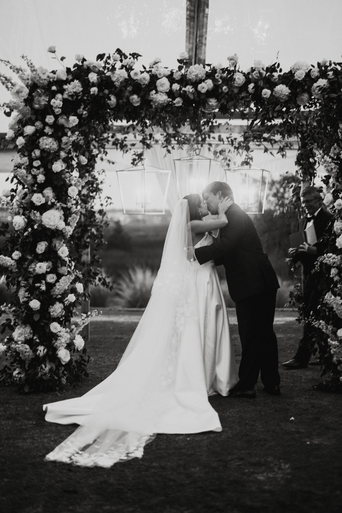 Carley wowed in a structured Suzanne Neville gown and Sareh Nouri cathedral-length veil.