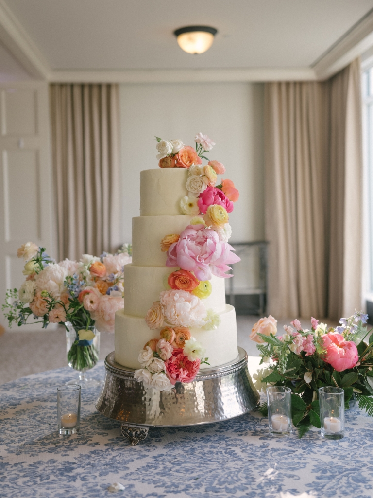 The wedding cake, by Ashley Bakery, featured buttercream frosting over alternating layers of lemon and chocolate cake–or, as Pixie puts it, “four tiers of pure heaven.”
