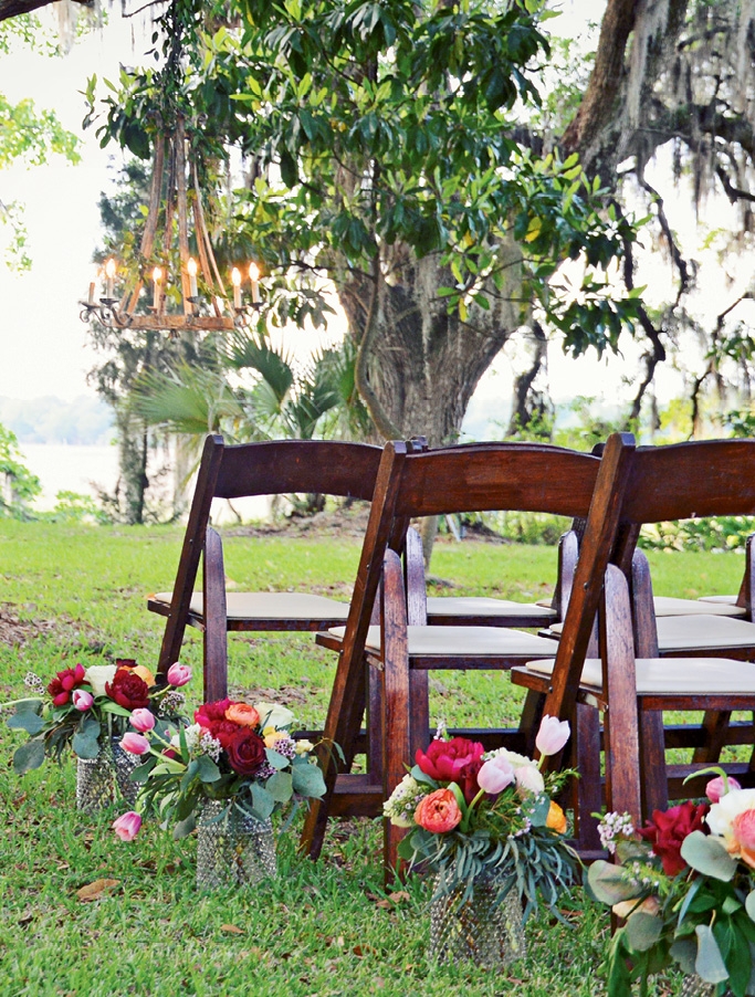 Guests looked upon the couple, grand  trees, and the  Ashley River. (Image by McKay Photography)