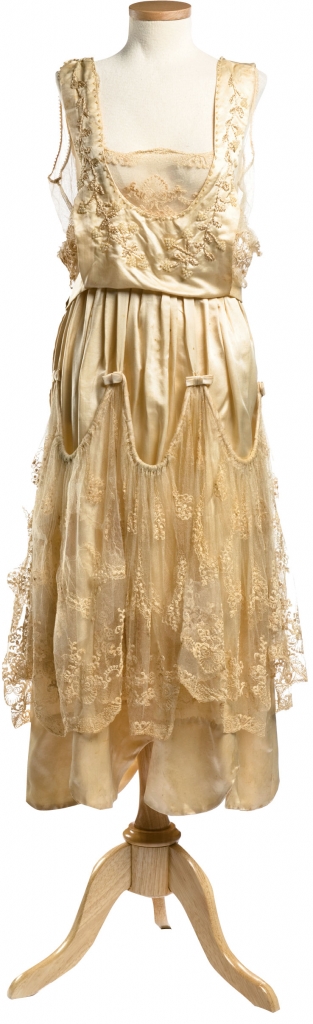 Annie Kangeter, 1921: Charleston’s Annie Kangeter wore this tea-length silk and lace dress (stitched by her sister) to marry Charles D. Boette on April 14, 1921. Loose draping gracing both the bodice and skirt added a feminine (and super stylish) layered look to her flapper-chic frock.
