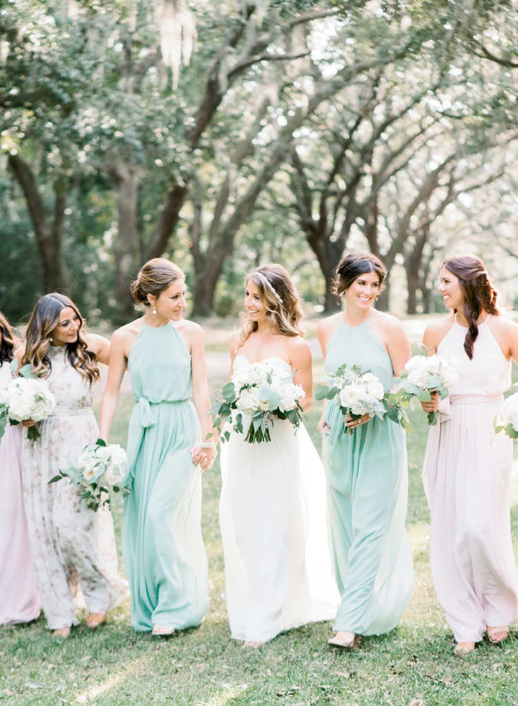 After gleaning inspiration from  Pinterest, Dani knew she wanted her attendants to don gowns in different hues and prints. To keep the look streamlined, she chose one frock—“Alana” from BHLDN—that was offered in a host of coordinating colors and patterns.   &lt;i&gt;Image Aaron &amp; Jillian Photography&lt;/i&gt;
