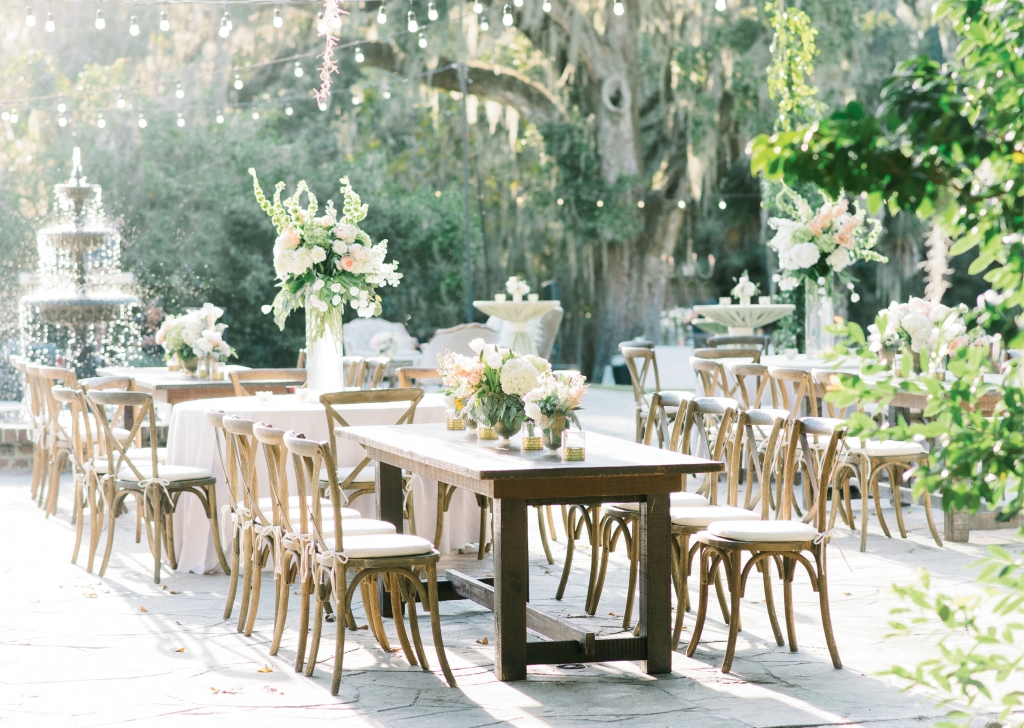 Though rich mahogany folding chairs were originally slated for the dinner space, the team at Fox Events swapped lighter-hued X-back chairs in at the last minute to better suit the palette of the florals.  &lt;i&gt;Image Aaron &amp; Jillian Photography&lt;/i&gt;