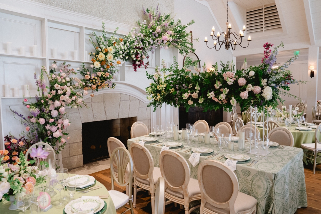 Florals climbed the reception walls, giving the sense that flowers grew all around.