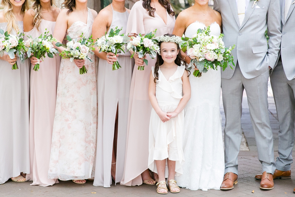 TIP: Let your flower girl shine. Elena&#039;s littlest wedding party member donned gold sandals (from Target).  Image by Dana Cubbage Weddings