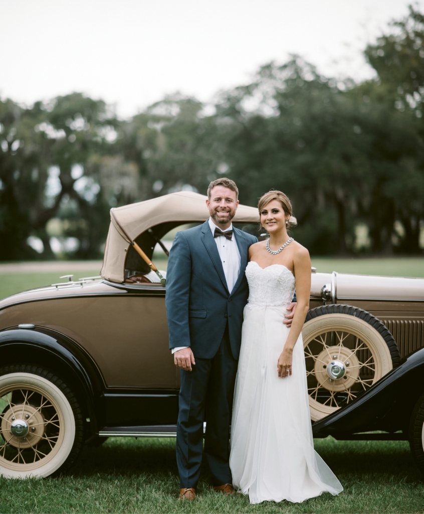 A focal point of the wedding—besides the newlyweds, of course—was the groom&#039;s dad&#039;s vintage car, which carried the couple around the plantation after their vows. (Photograph by Sean Money + Elizabeth Fay)