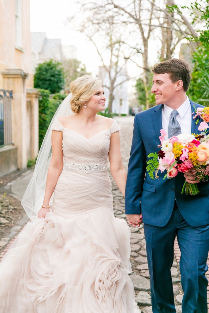 Florals by Branch Design Studio. Bride&#039;s gown by Essense of Australia from Gown Boutique of Charleston. Hair and makeup by Lashes and Lace. Groom&#039;s attire from Jos. A. Bank. Photograph by Dana Cubbage Weddings.