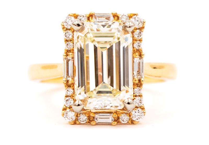 3.32-carat emerald-cut diamond with  diamond halo in 14K yellow gold (price upon request) from Sandler’s Diamond’s &amp; Time