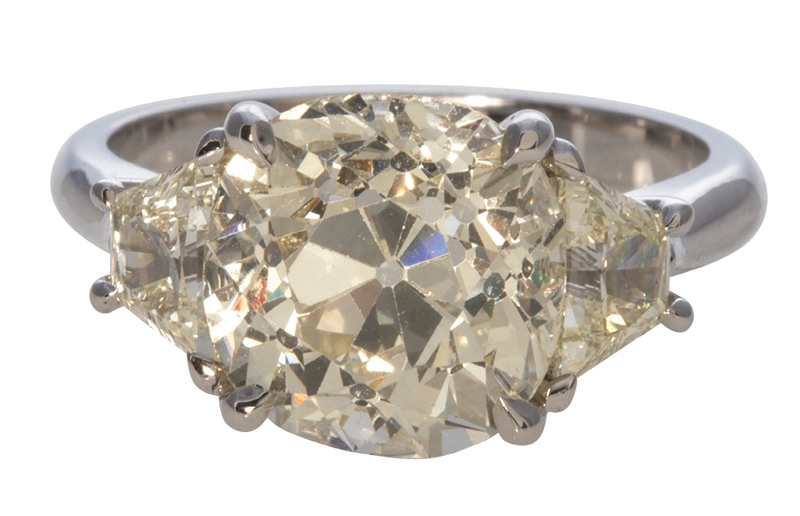 Estate old mine and trapezoid diamond (5.52 carats total) ring in 18K white gold from Croghan’s Jewel Box ($59,000)