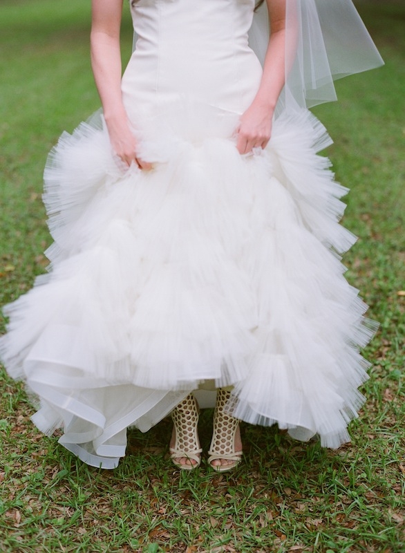 Gown designed by bride, constructed by Bernardo Aguayo. Shoes by Alexander McQueen. Image by Gayle Brooker Photography.