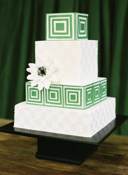 PATTERN MAGIC: The checkerboard design on the geometric masterpiece by Wedding Cakes by Jim Smeal riffed off patterns and colors from the invitation suite, the dance floor tiles, and more.