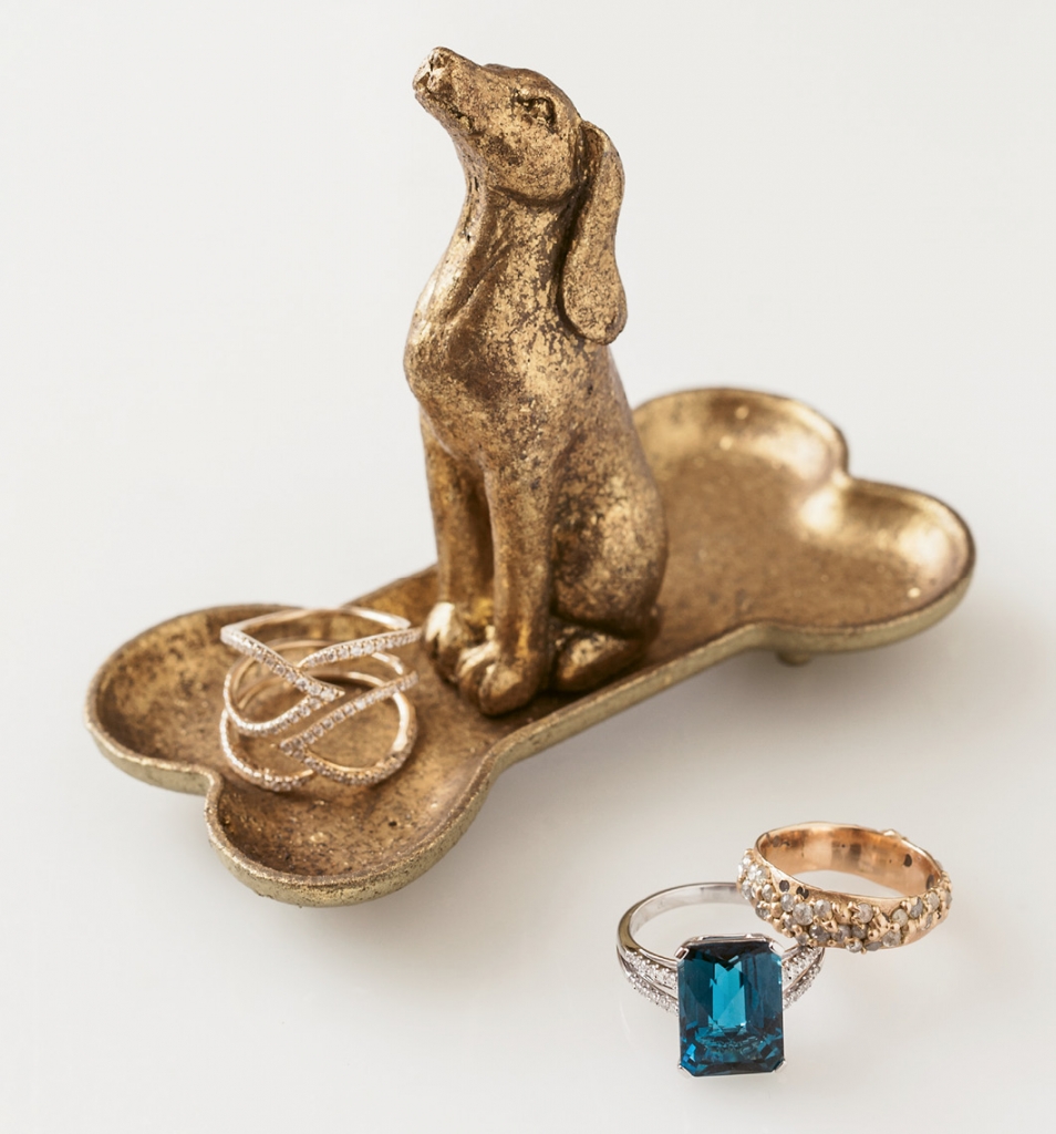 Gabriel &amp; Co.’s diamond and gold ring ($1,450 from Polly’s Fine Jewelry). PE Jay Creation’s London blue topaz, diamond, and gold ring ($1,550 from Diamonds Direct). Polly Wales’ white and rose diamond and gold ring (price upon request from RTW). Dog stand ($8 from Southern Accent Designer Showcase).   &lt;i&gt;Photograph Gayle Brooker&lt;/i&gt;