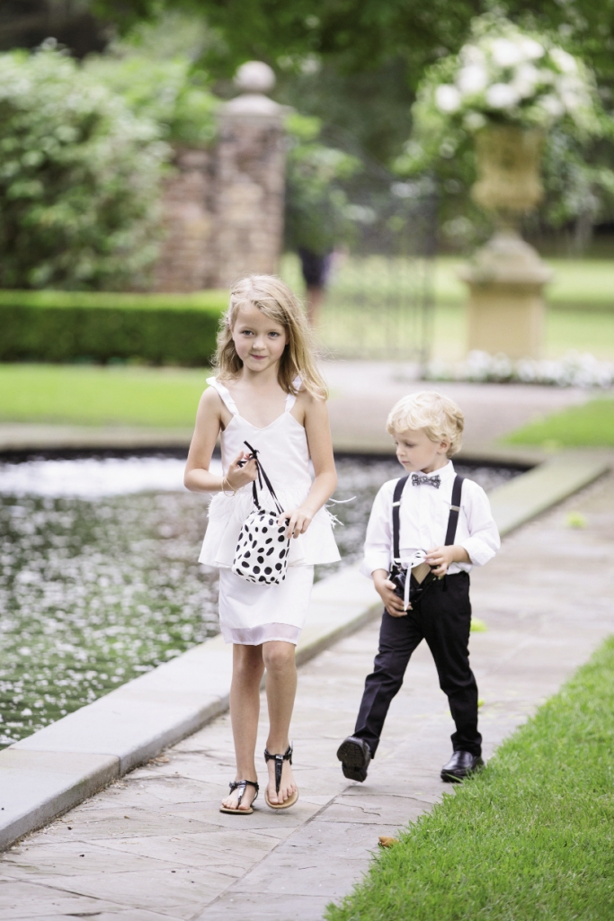 TODDLERS &amp; TWEENS: Tucker toted a toy truck for his ring “pillow;” the bride designed Kate’s flower girl dress.