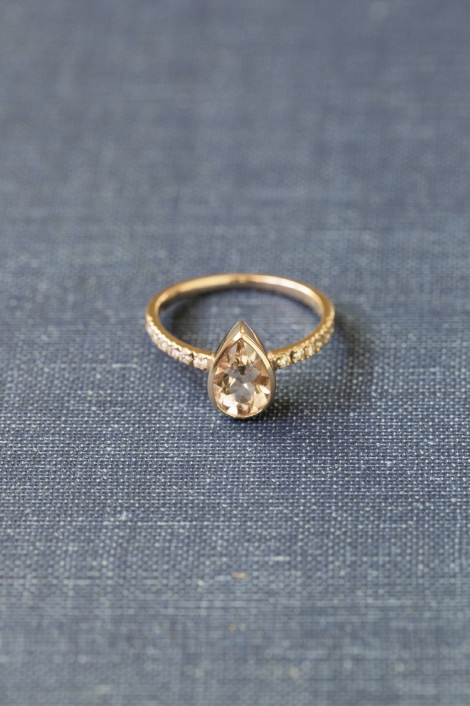 Local artisan Sea + Stone’s 14K rose gold ring with pear-shaped morganite center and pavé diamonds (.18 total cts.), $1,525 from Kiawah Fine Jewelry