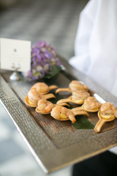 WHAT’S APP: Hors d’oeuvres provided by Fish Restaurant included baby fried green tomatoes, mini lobster rolls, and these delectable bites: shrimp and soft gouda grits on edible cracker spoons.