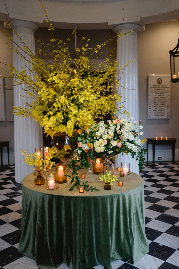 Playing with scale, texture, and splashes of color, the entry table and conversation areas beckoned guests into the party.