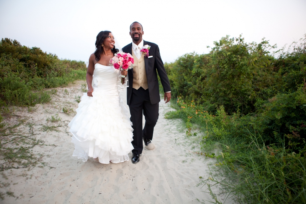 SURE OF THE SHORE: The couple says choosing the reception venue was simple: “We both love the beach, with the bride being raised in Charleston and the groom being of Jamaican ancestry, it was only fitting that we had a venue on the water,” says Marissa. “The Sand Dunes Club is one of the best beach venues in the Charleston area.”