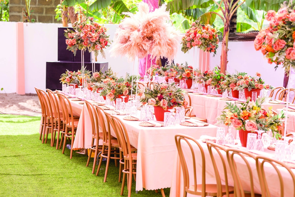 The reception reflected her love of “all things pink and romantic” with rose floral arrangements.