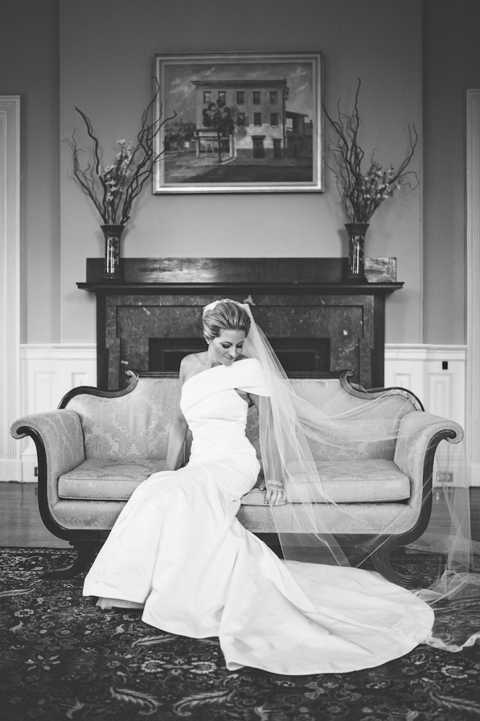 Bride&#039;s gown by Amsale (available locally at White on Daniel Island). Hair by Patrick Navarro. Makeup by Bellelina Skincare Spa and Makeup Studio. Image by Andrew Cebulka Photography.