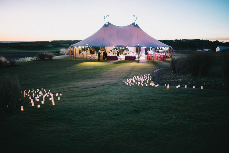 Tent by Sperry Tents Southeast. Wedding design by A Charleston Bride. Photograph by Sean Money &amp; Elizabeth Fay at the Ocean Course at Kiawah Island.