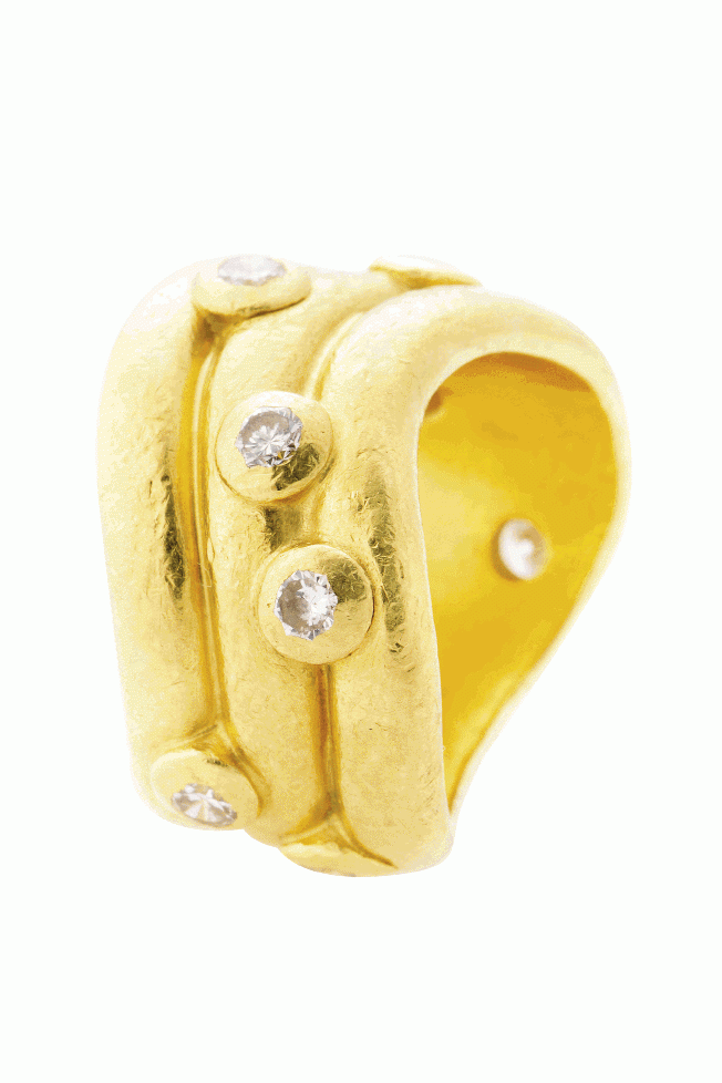 STATEMENT PIECE: Sarah Amos’ 22K yellow gold ring with 11 rose-cut diamonds (2 total cts.) Helena Fox Fine Art, $15,000