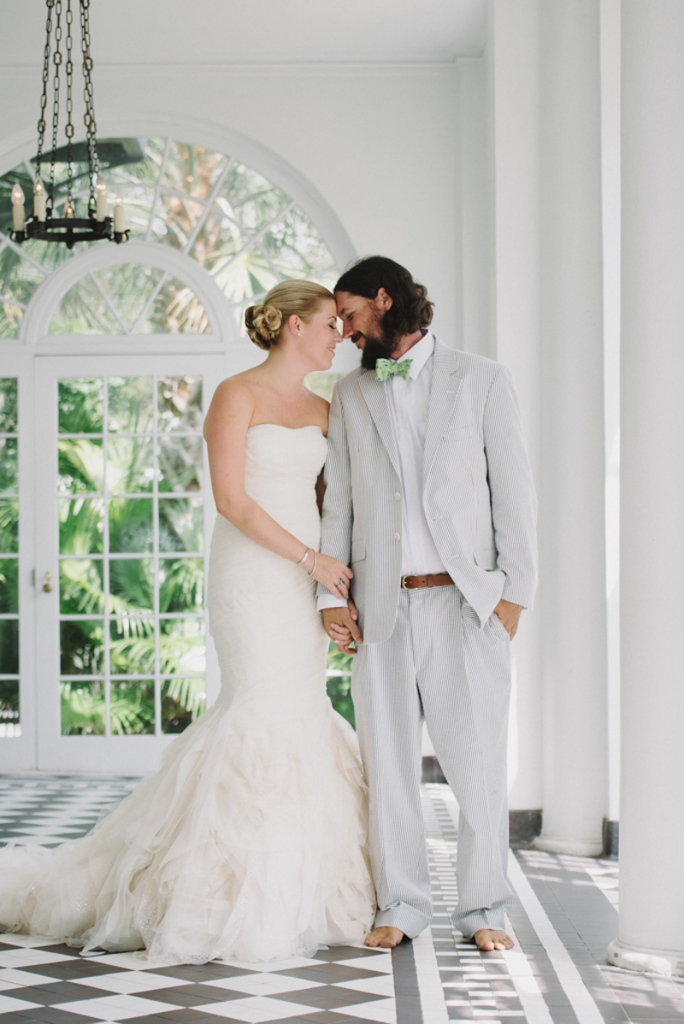 Bridal gown by Vera Wang. Groom’s suit by Hardwicks and bow tie from Bird Dog Bay. Photograph by Sean Money + Elizabeth Fay at Lowndes Grove Plantation.