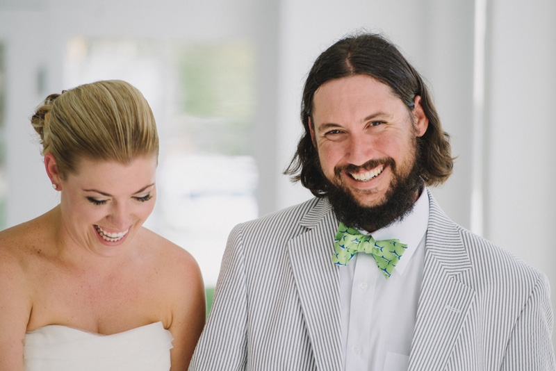 Groom’s suit by Hardwicks and bow tie by Bird Dog Bay. Bride’s hair and makeup by Elysium Salon and Wedding Hair by Charlotte. Photograph by Sean Money + Elizabeth Fay at Lowndes Grove Plantation.