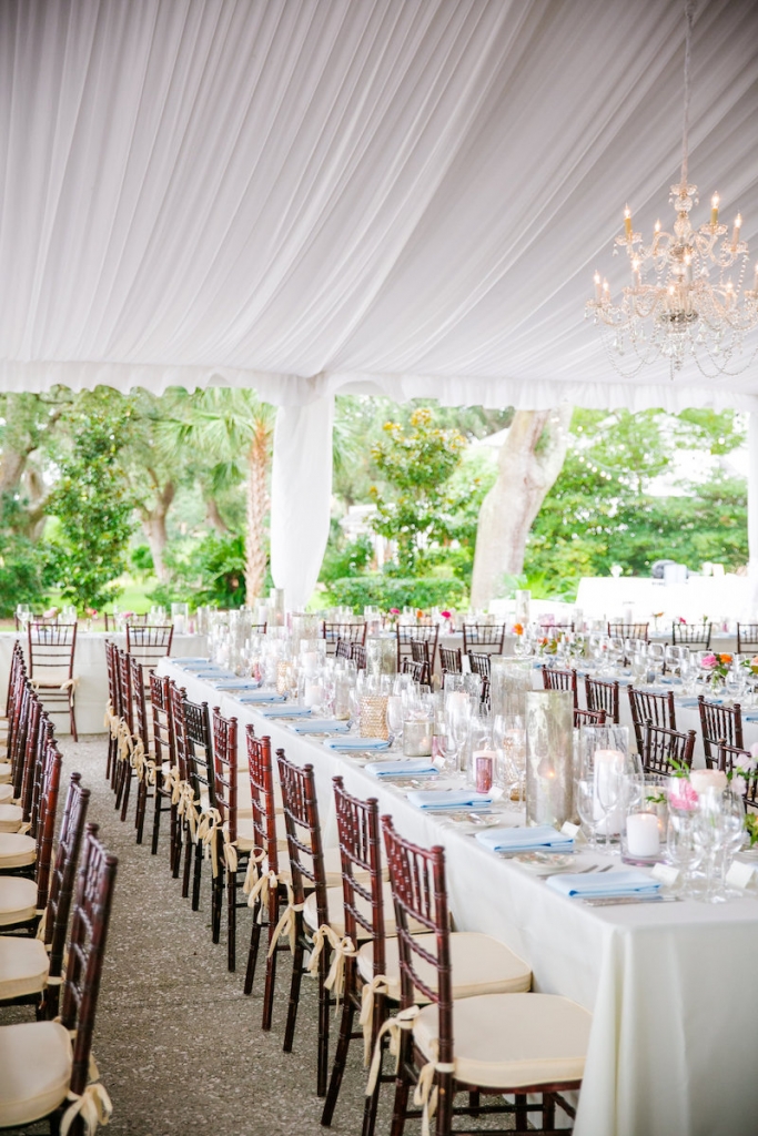 Wedding design by Pure Luxe Bride. Tabletop rentals and linens from EventWords. Tent from Snyder Event Rentals. Lighting by Innovative Event Services. Image by Dana Cubbage Weddings at Lowndes Grove Plantation.