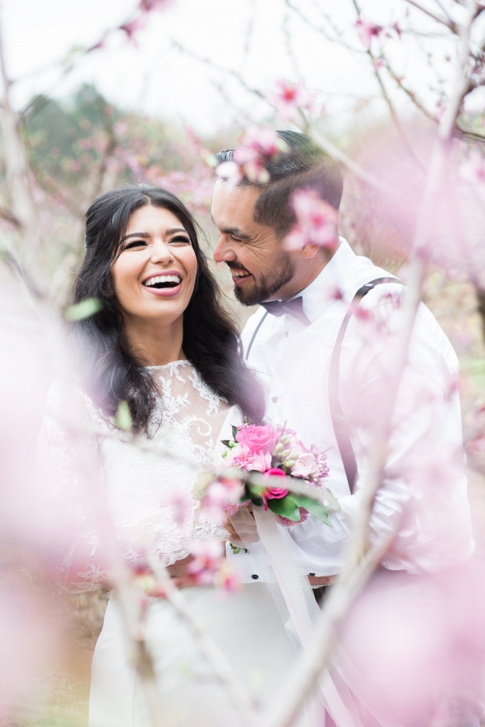 Last March—11 years after they wed—Marilu and Cesar Segura held a do-over portrait session in Charleston. Boone Hall Plantation (where peach blossoms were in full bloom) hosted some of the stunning shots. &lt;i&gt;Image by Judy Nunez Photography&lt;/i&gt;