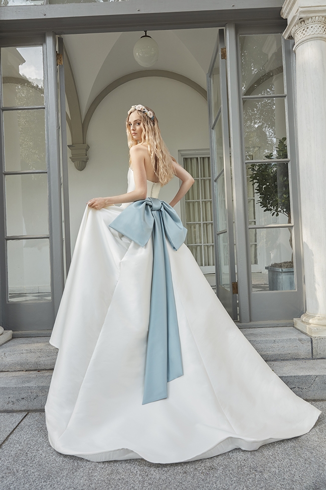 Timeless Twist - “Narcissus” dress by Sareh Nouri Why We Love It “The bold, beautiful bow is a novel take on something blue.”  –Michelle Miller,  Maddison Row South