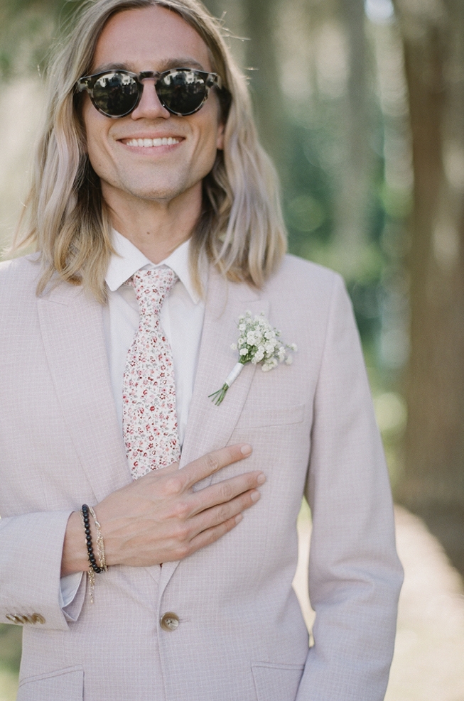 Ethan Woodring, one of Meg’s oldest friends and a member of her bridal party, donned a crisp suit that matched the ladies’ Show Me Your Mumu gowns. “The tie was a last-minute Etsy find!,” Meg says.