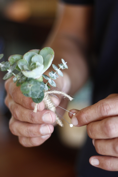 Succulent boutonnieres wrapped with twine