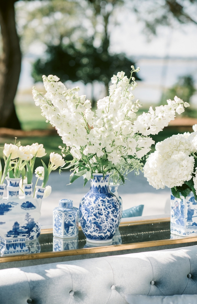 Pattered ginger jars from florist SYG Designs held double tulips, delphinium, hydrangeas, and more.