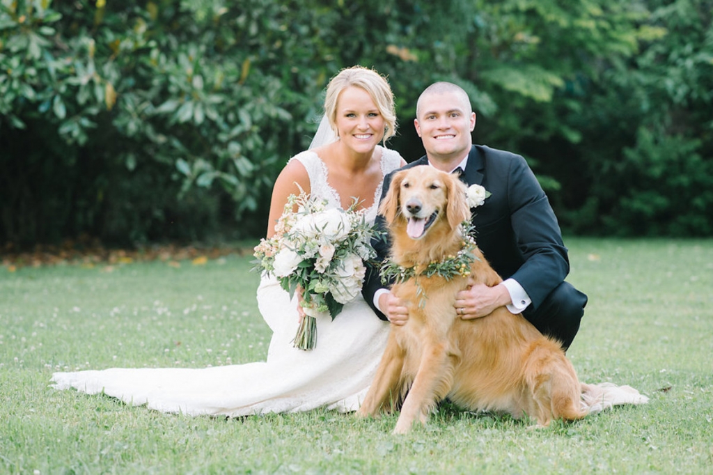 Image by Aaron &amp; Jillian Photography at Magnolia Plantation &amp; Gardens. Bride&#039;s attire by Mikaella. Hair by Paper Dolls. Groom&#039;s attire by Men&#039;s Wearhouse. Bouquet and dog collar by Wildflowers Inc.