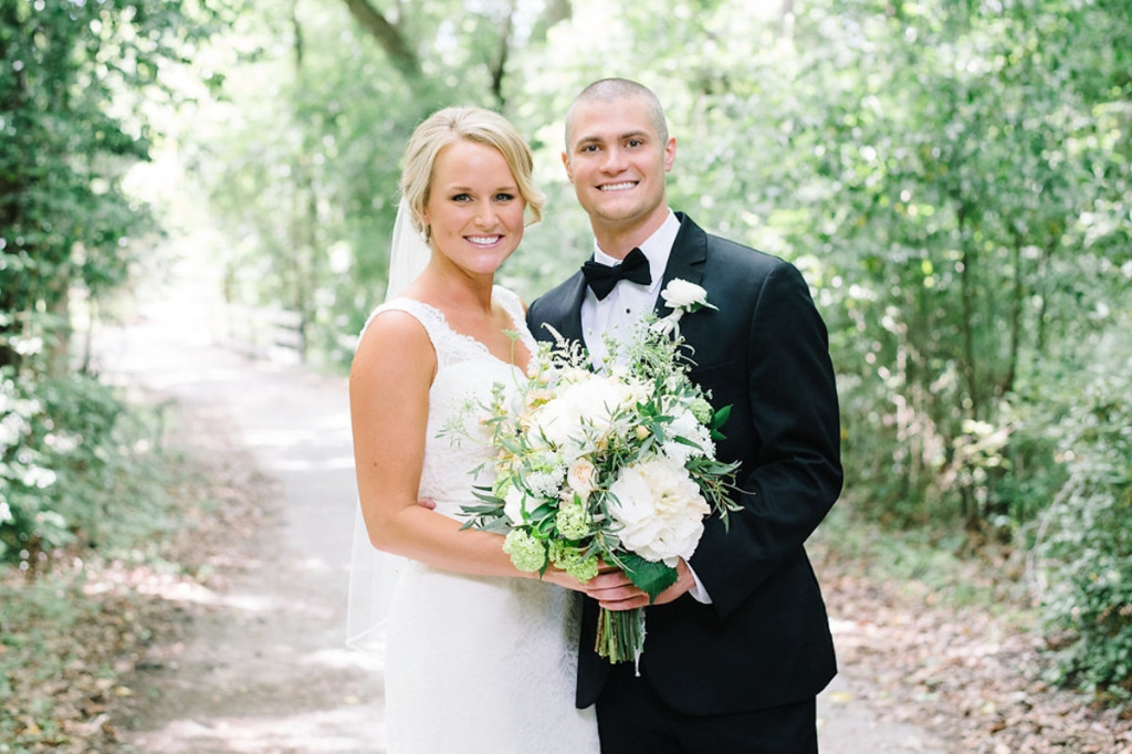 Image by Aaron &amp; Jillian Photography at Magnolia Plantation &amp; Gardens. Bride&#039;s attire by Mikaella. Hair by Paper Dolls. Groom&#039;s attire by Men&#039;s Wearhouse. Bouquet by Wildflowers Inc.
