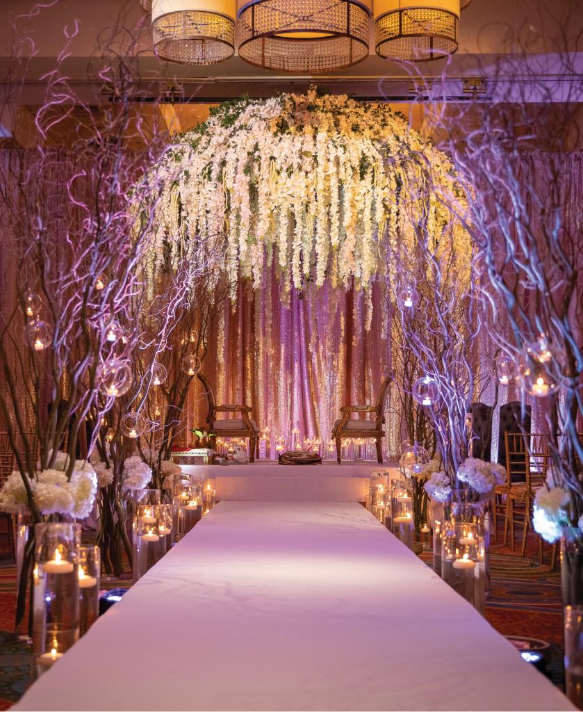 Swati and Brijesh Patel exchanged vows underneath a cascading floral mandap, or canopy