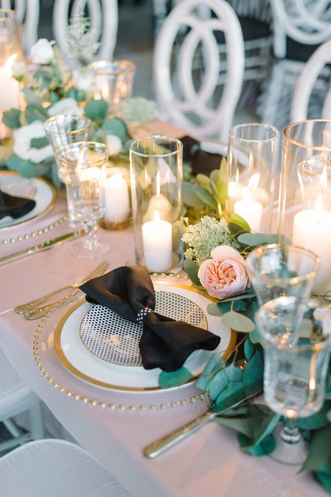 Let the head table make the biggest design statement, like with this dotted salad plate, charger rimmed with golden beads, and bow-tied napkins. &lt;i&gt;Photograph Lauren Jonas&lt;/i&gt;